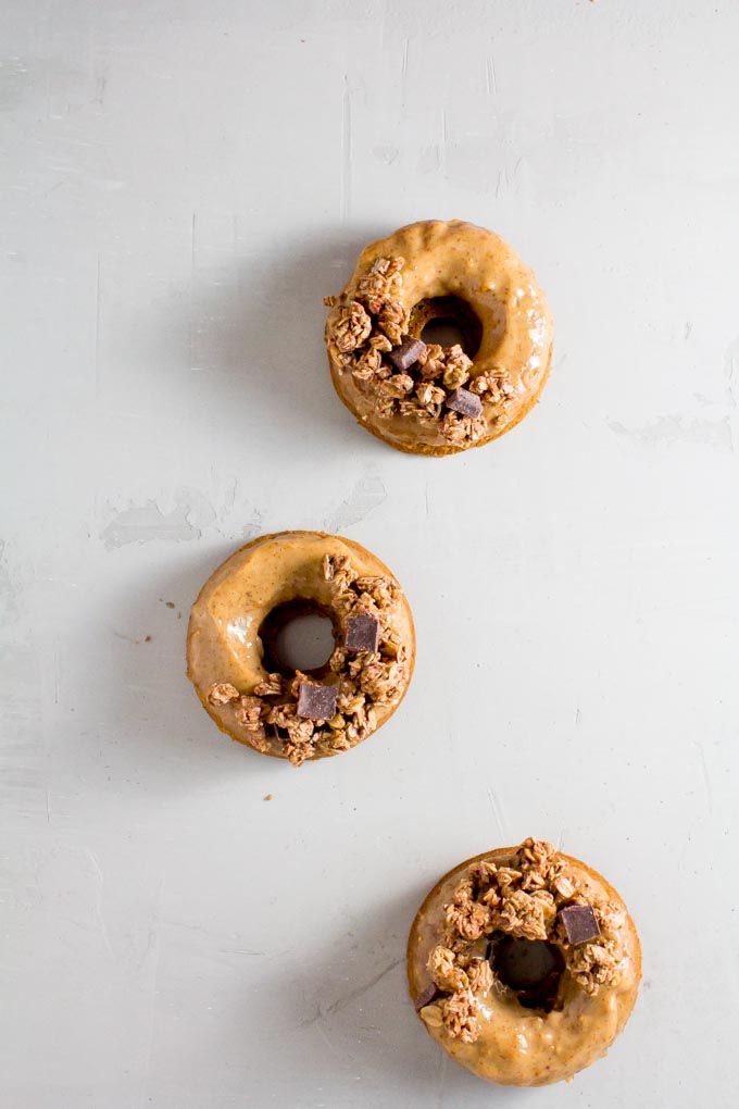 gingerbread baked donuts with granola almond butter glaze | immaEATthat.com