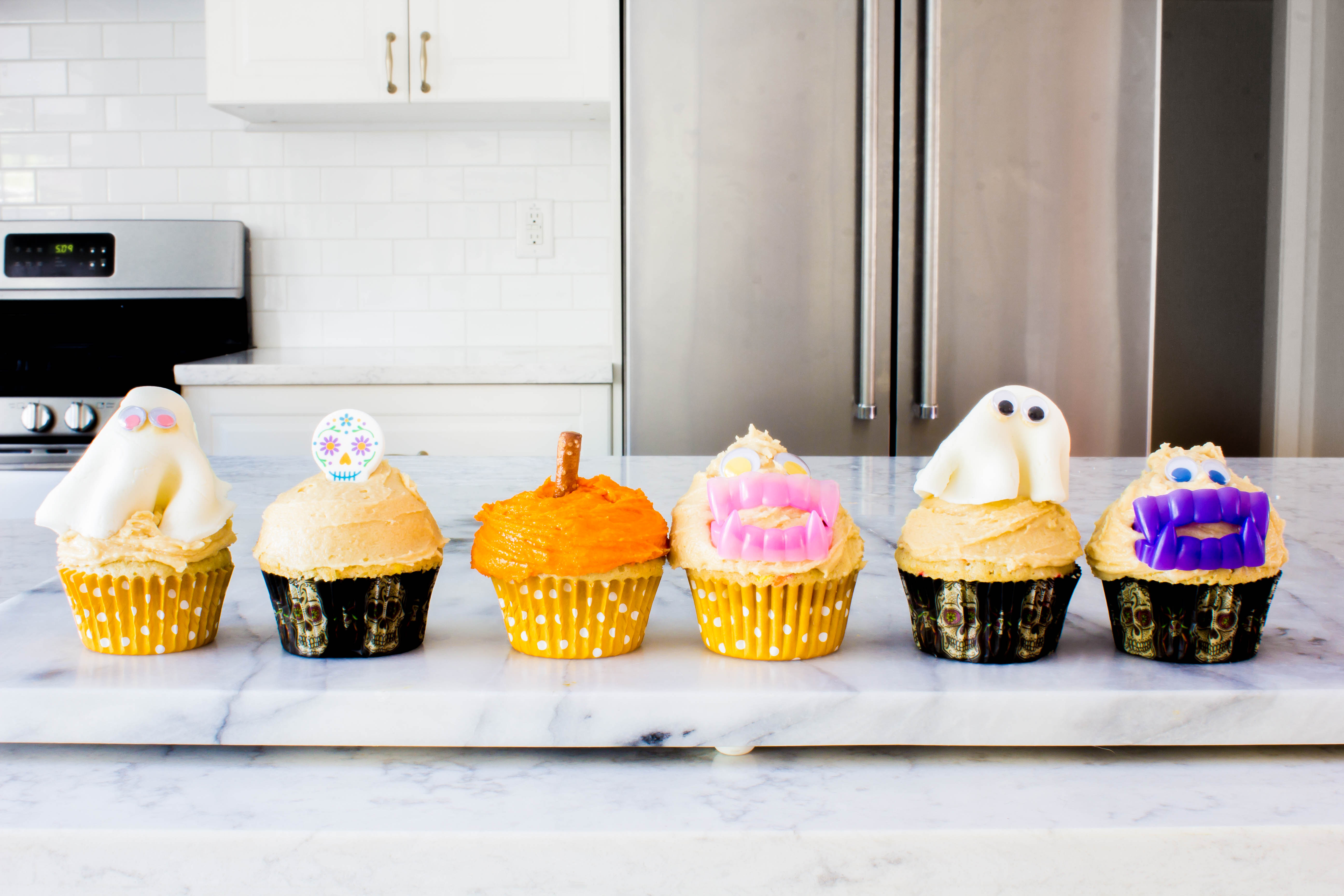 Festive and fun Halloween cupcake decorating ideas with black cherry funfetti cupcakes + maple brown sugar frosting | immaEATthat.